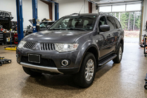 Mitsubishi Pajero Sport 2008–2015 Sidosteg Allmond Black (2 st, aluminium) foto 1