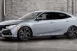 Fem­dörrars halvkombi av tionde generationen Honda Civic 5D foto 1