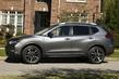 Andra generationen av crossovern Nissan Rogue foto 10