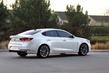 Andra generationen av sedanen KIA Cadenza foto 3