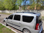 Lada Largus 2012– Svarta takrails foto 1
