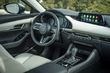 Fjärde generationen av den kompakta sedanen Mazda 3 foto 9