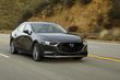 Fjärde generationen av den kompakta sedanen Mazda 3 foto 7