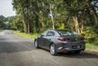 Fjärde generationen av den kompakta sedanen Mazda 3 foto 6