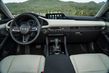 Fjärde generationen av den kompakta sedanen Mazda 3 foto 8