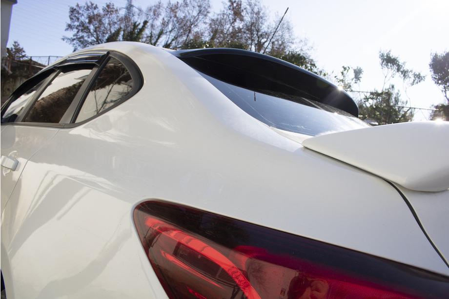 Opel Astra J 2009–2015 Bakrutespoiler Sedan (ABS) Foto 3