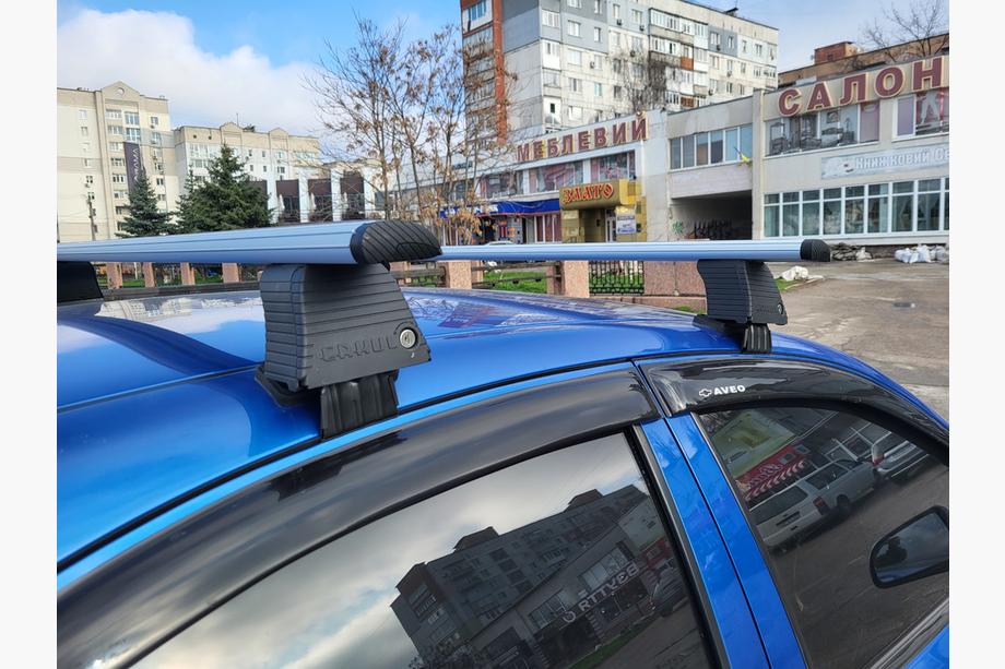 Chevrolet Aveo T250 2005–2011 Takräcke tvärbalkar för slätt tak (2 st, Asaf V4) Image