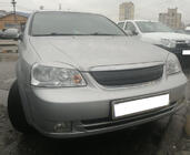 Chevrolet Lacetti 2003–2024 Vintertäckning för grill (SD/SW, övre) foto 2