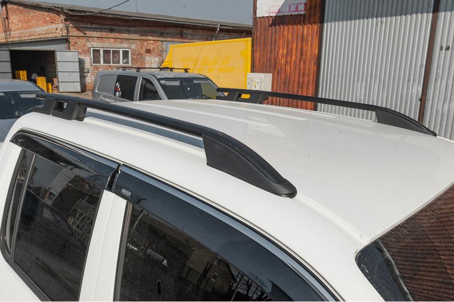 Volkswagen Amarok 2010–2022 Takrails OmsaLine Sport (2 st, svarta) Foto 1