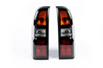 Nissan Patrol Y61 1997–2011 Baklyktor Dark Safari (2004-2008, 2 st) foto 3