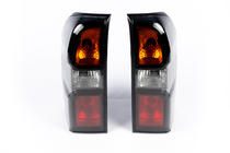 Nissan Patrol Y61 1997–2011 Baklyktor Dark Safari (2004-2008, 2 st) foto 4