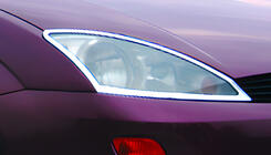 Ford Focus I 1998–2005 Strålkastarramar (2 st, plast) foto 1