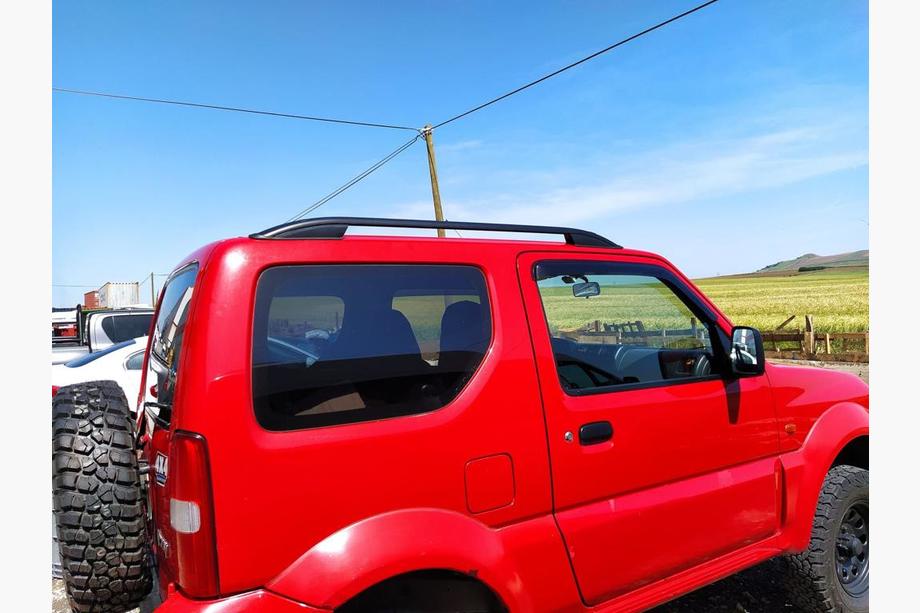 Suzuki Jimny 1998–2018 Takrails Skyport (svarta) Image