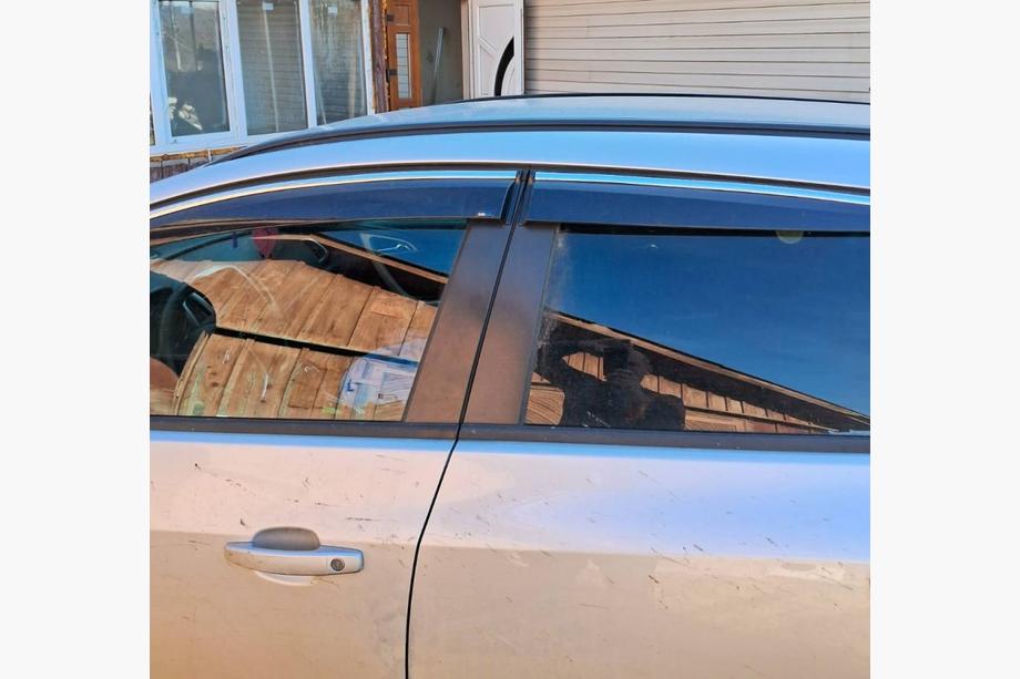 Opel Astra J 2009–2015 Vindavvisare med kromlist och rand HB/SD (4 st, Sunplex Chrome) Image