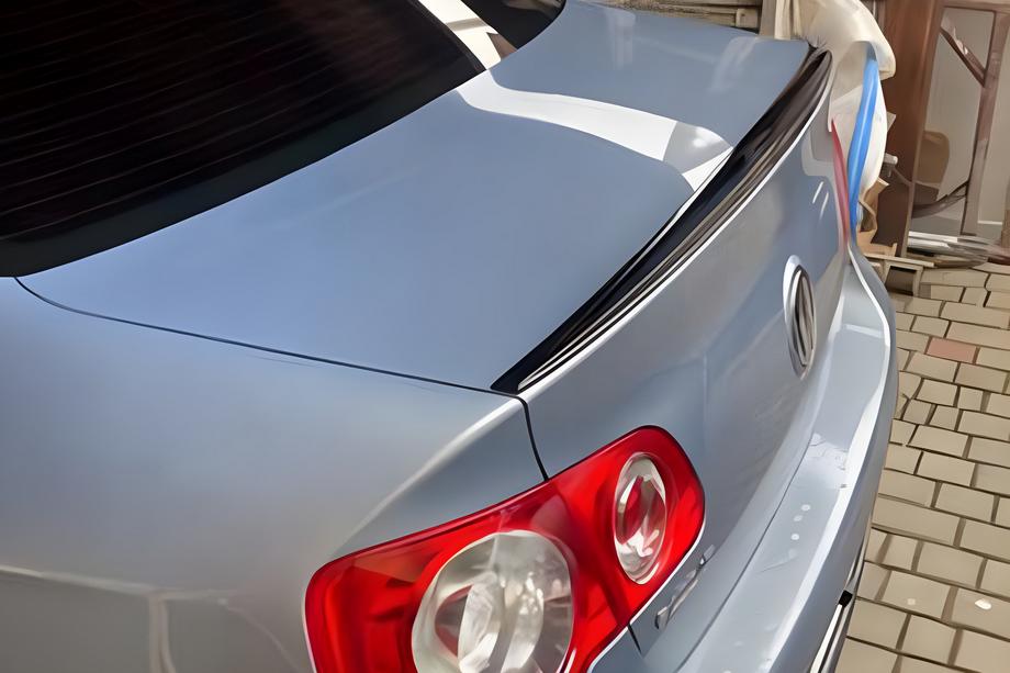 Volkswagen Jetta 2006–2011 LIP-spoiler (Sunplex, svart) (115,8 cm x 6,3 cm) Foto 1