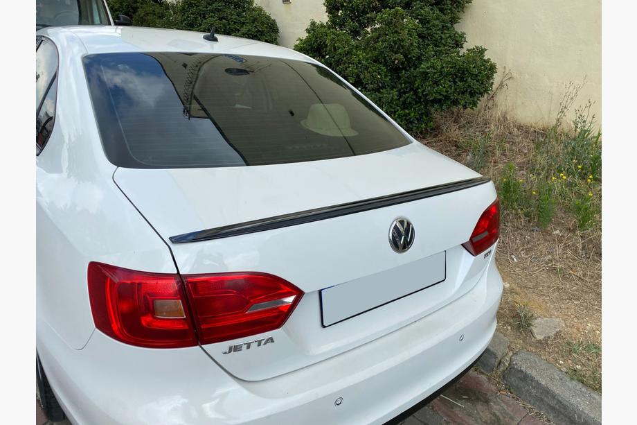 Volkswagen Jetta 2011–2018 LIP-spoiler (Sunplex, svart) (115,8 cm x 6,3 cm) Foto 1
