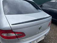 Skoda Superb 2009–2015 LIP-spoiler (Sunplex, svart) (115,8 cm x 6,3 cm) foto 1